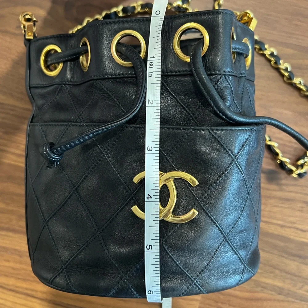 CHANEL Black Quilted Leather Drawstring Bucket Bag with Gold Hardware